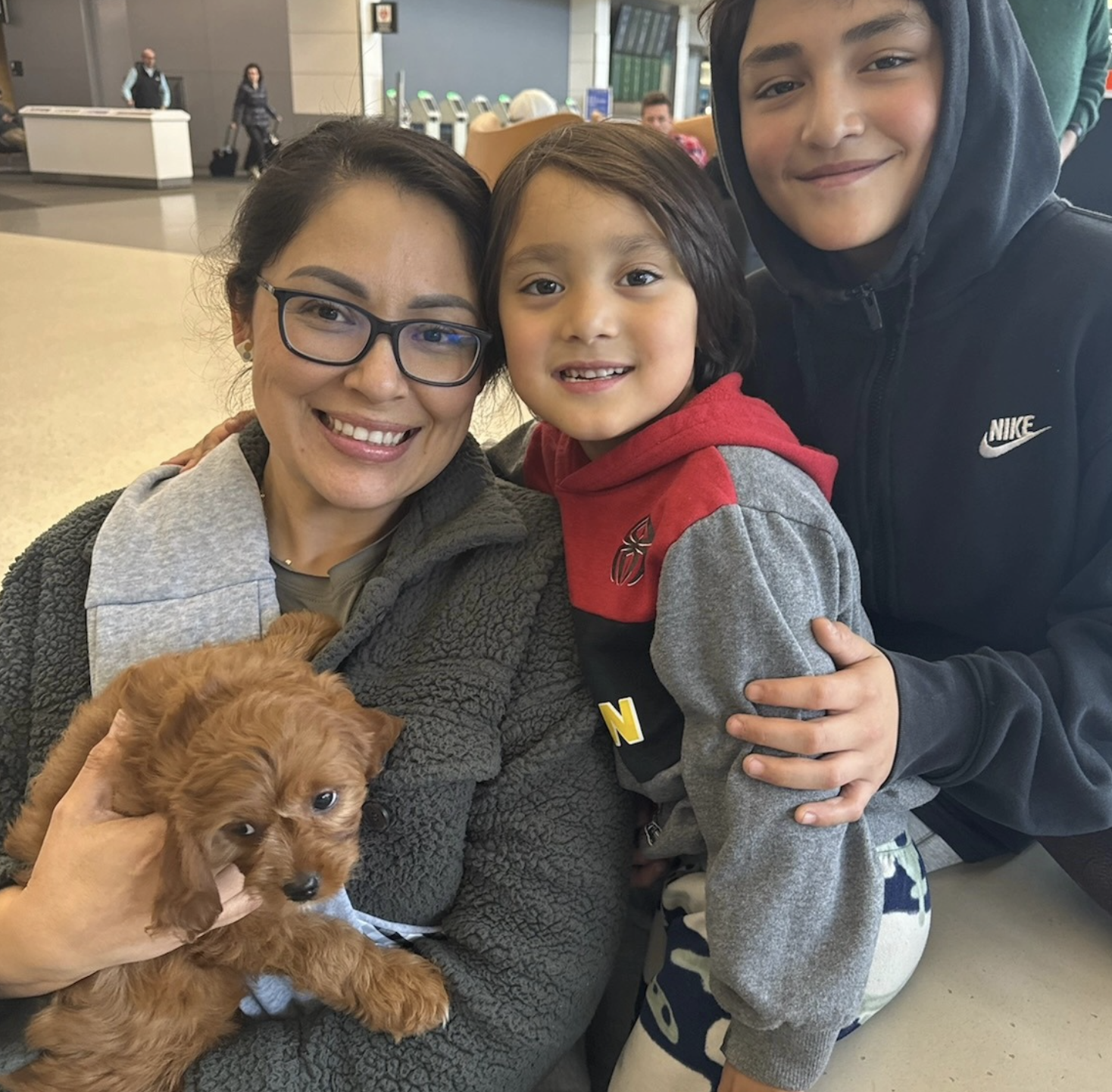 Lucky Doodle Pups graduate 11 with their forever family
